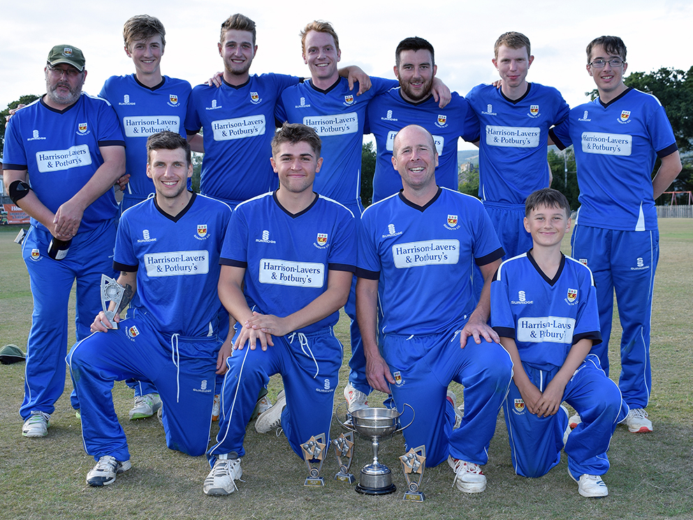 The triumphant Sidmouth team ready to let the bubbly flow. Back (left to right): Miles Dalton, Dylan Hurst, Toby Seldon, Nick Mansfield, Tom Clay, Issac Thomas, Jordan Fowler. Front: Lee Clayden, Ed Hurley, Anthony Griffiths, Ben Fisher 