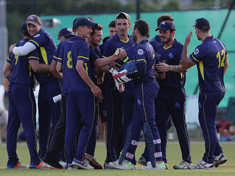 Devon celebrate after receiving confirmation they had beaten Suffolk