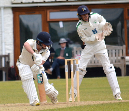 Elliot Hamilton glances backwards to see if he has been caught at slip in Devon's second innings. He was